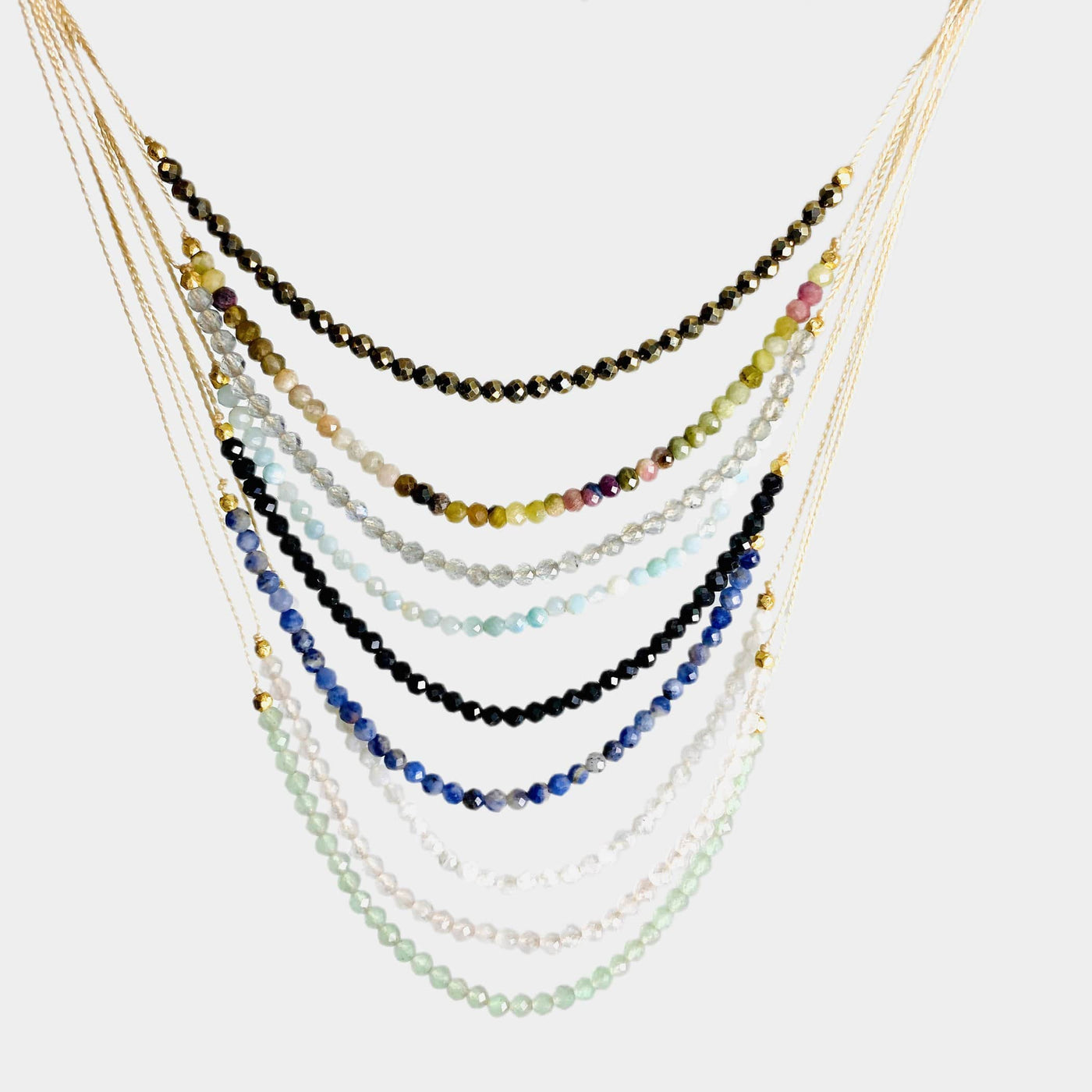 Gemstone Bead Finished Necklaces in different stones on a white background