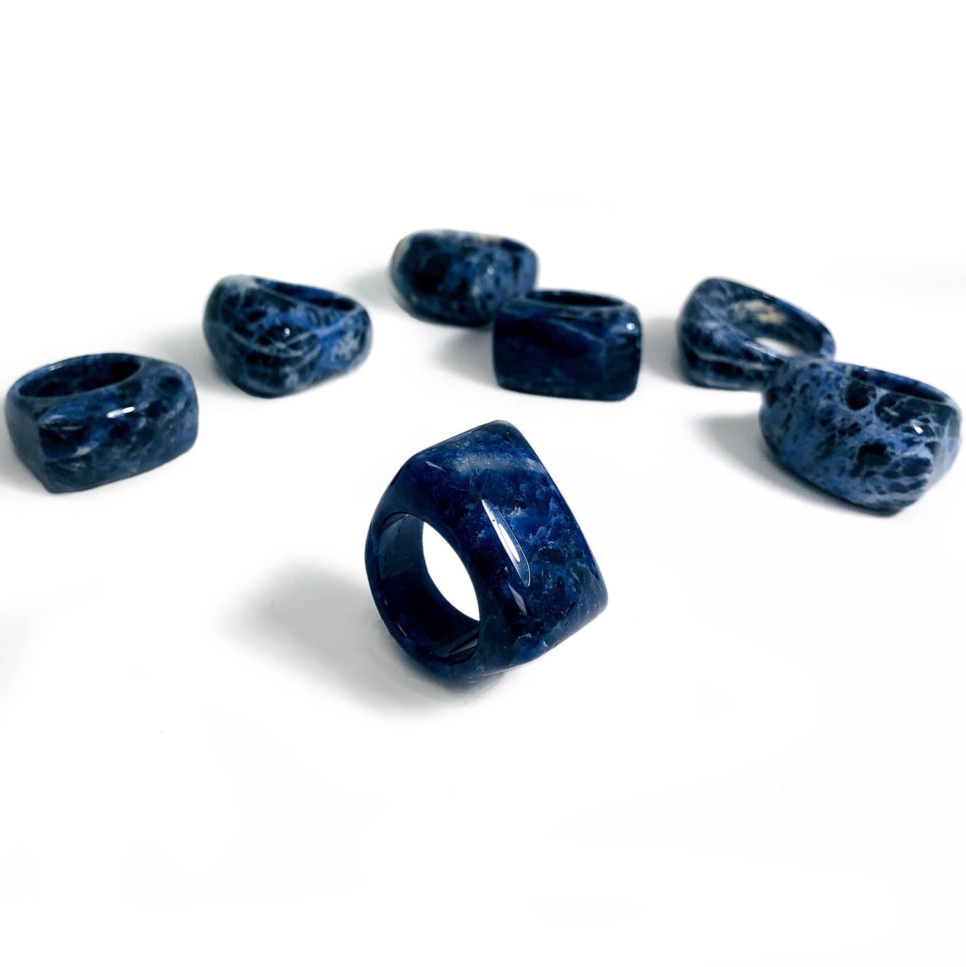 sodalite rings on a white background.