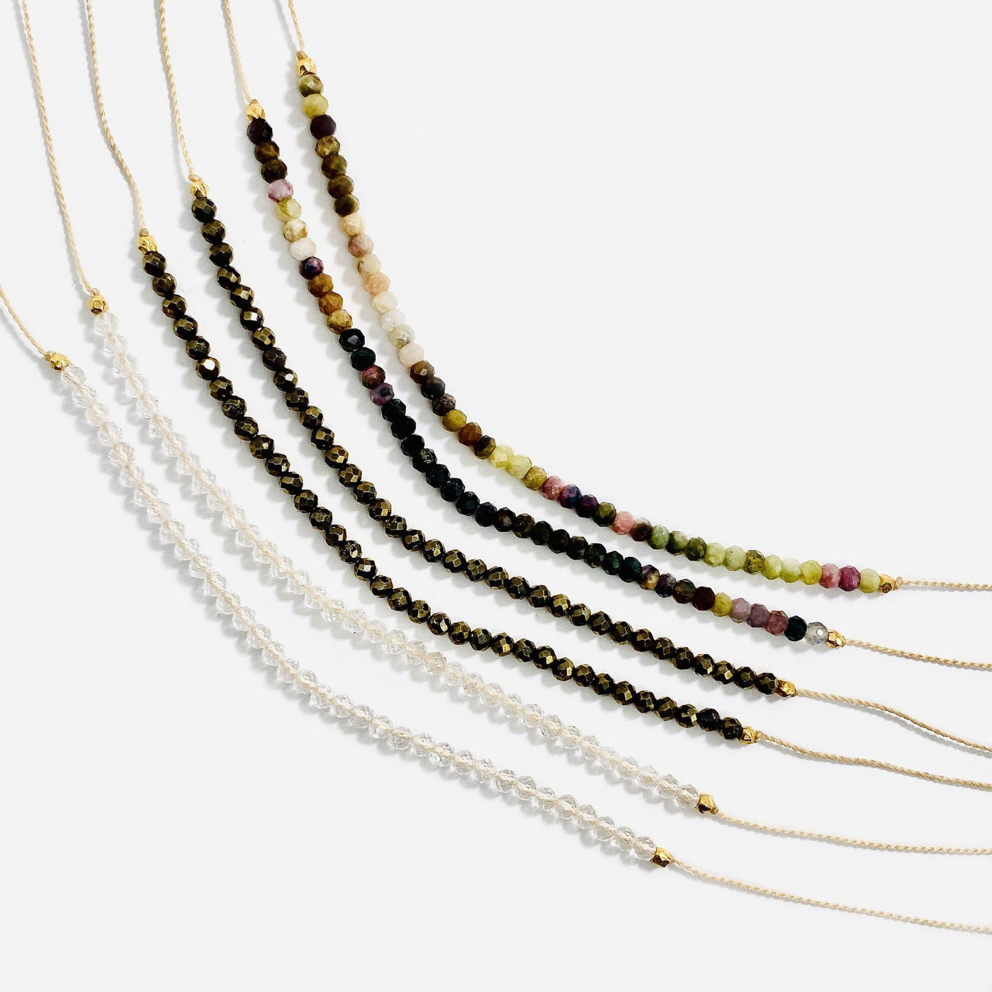Gemstone Bead Finished Necklaces three different types of stones on a white background