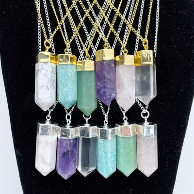 Assorted  Stone Point Necklaces on Gold or Silver Plated Chain on a necklace holder