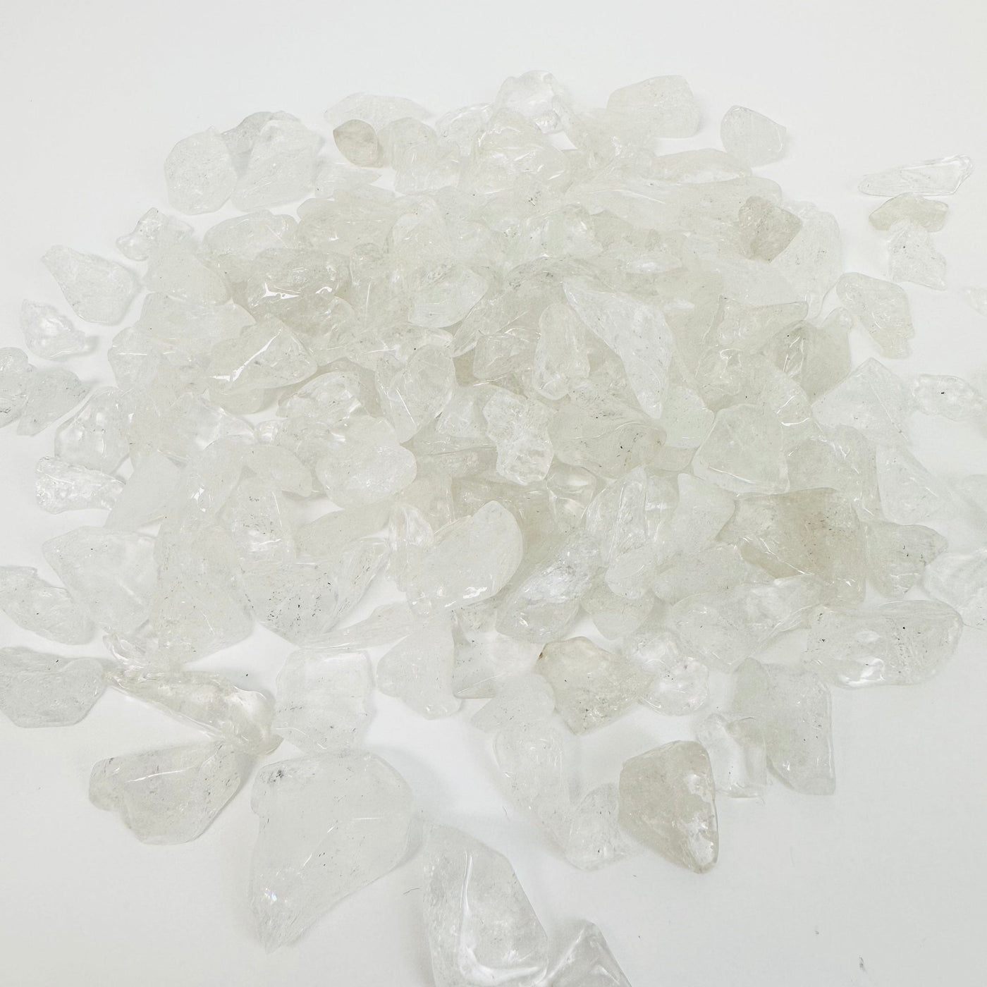 Crystal Quartz 1Lb Polished Freeform Chips - pile of crystal quartz chips 
