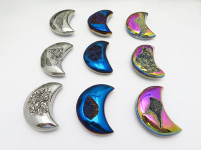 9 Titanium Druzy Moons in different colors on white background