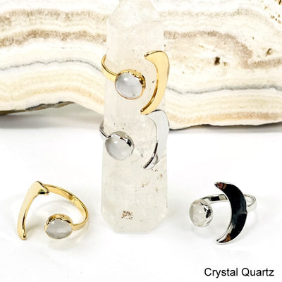 close up of moon rings with crystal quartz gemstone accent