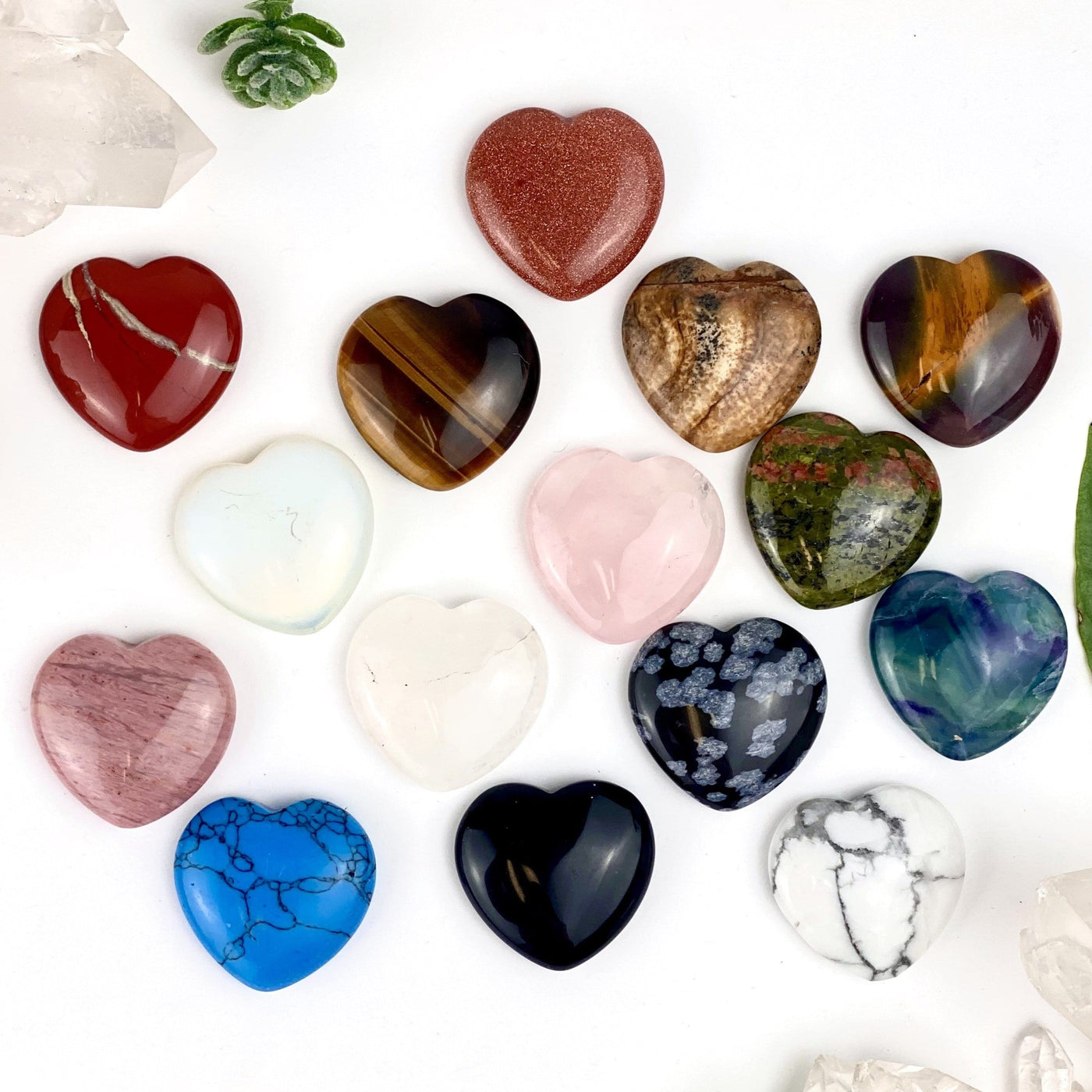 Gemstone Heart Thumb Stone Worry Stone displayed to show variations