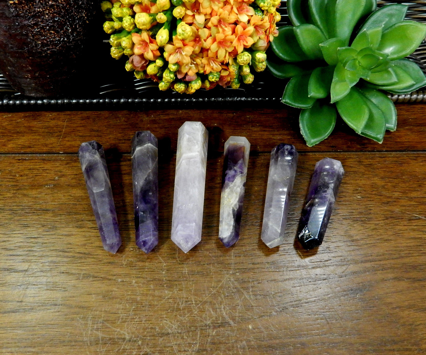 multiple amethyst points displayed to show the differences in the sizes and color shades 