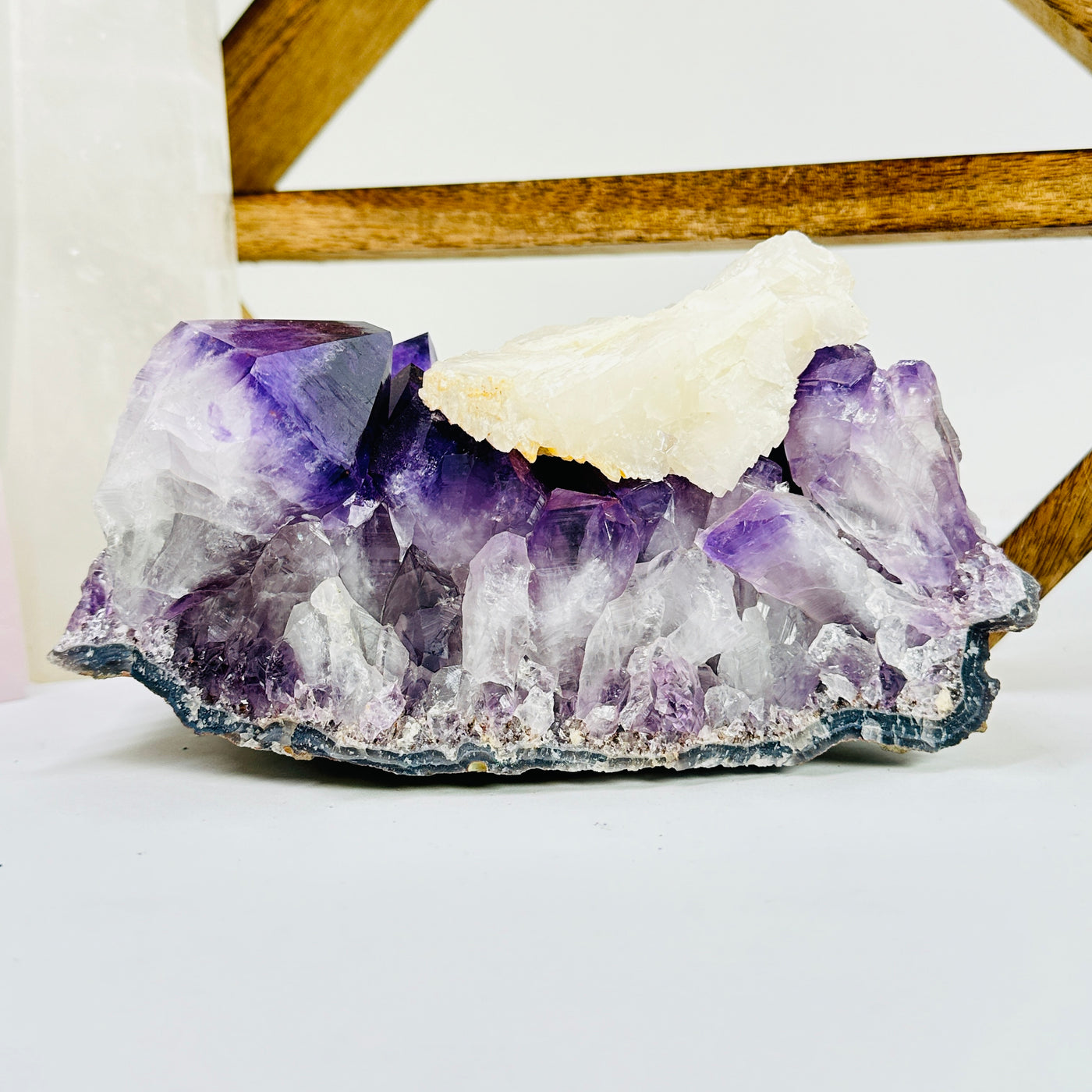 amethyst cut base with decorations in the background