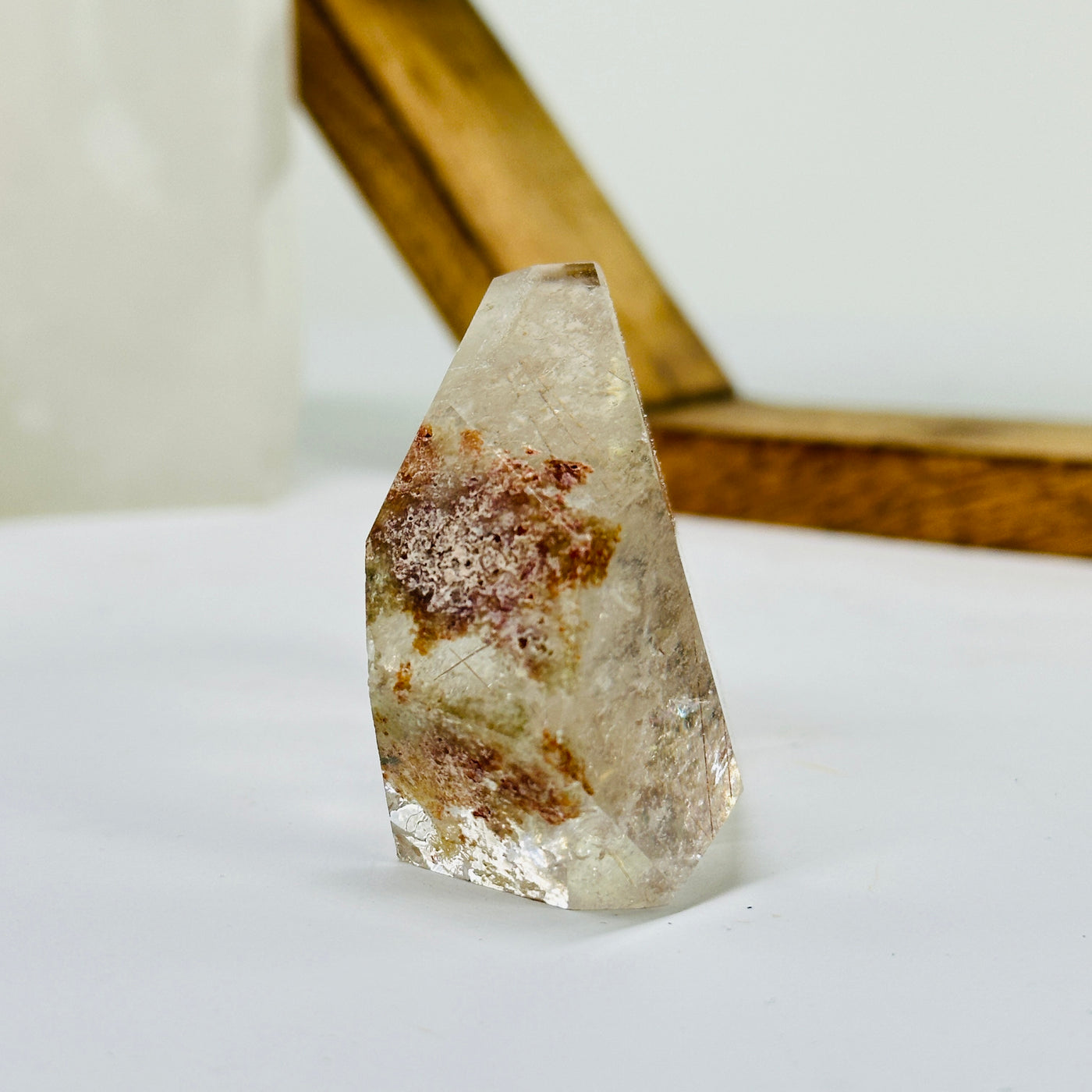 rutile quartz with decorations in the background