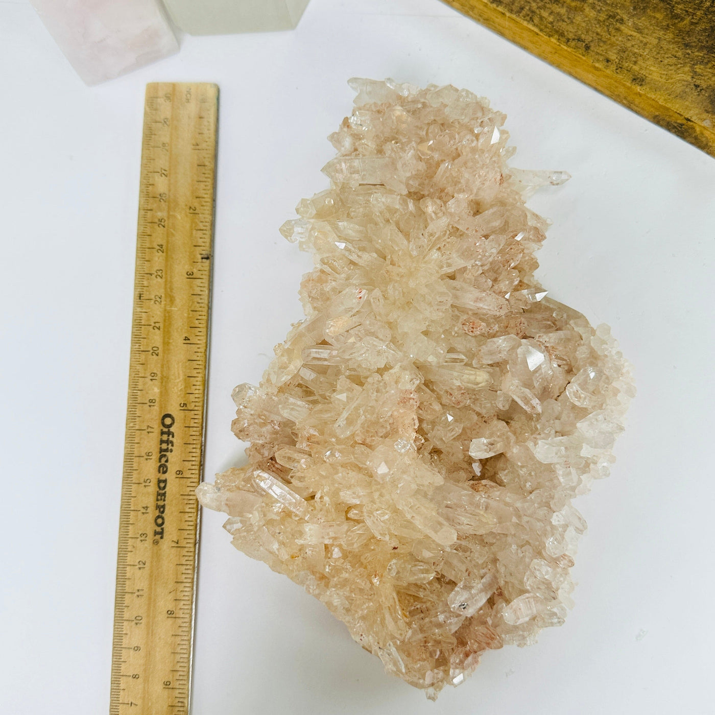 lemurian quartz next to a ruler for size reference