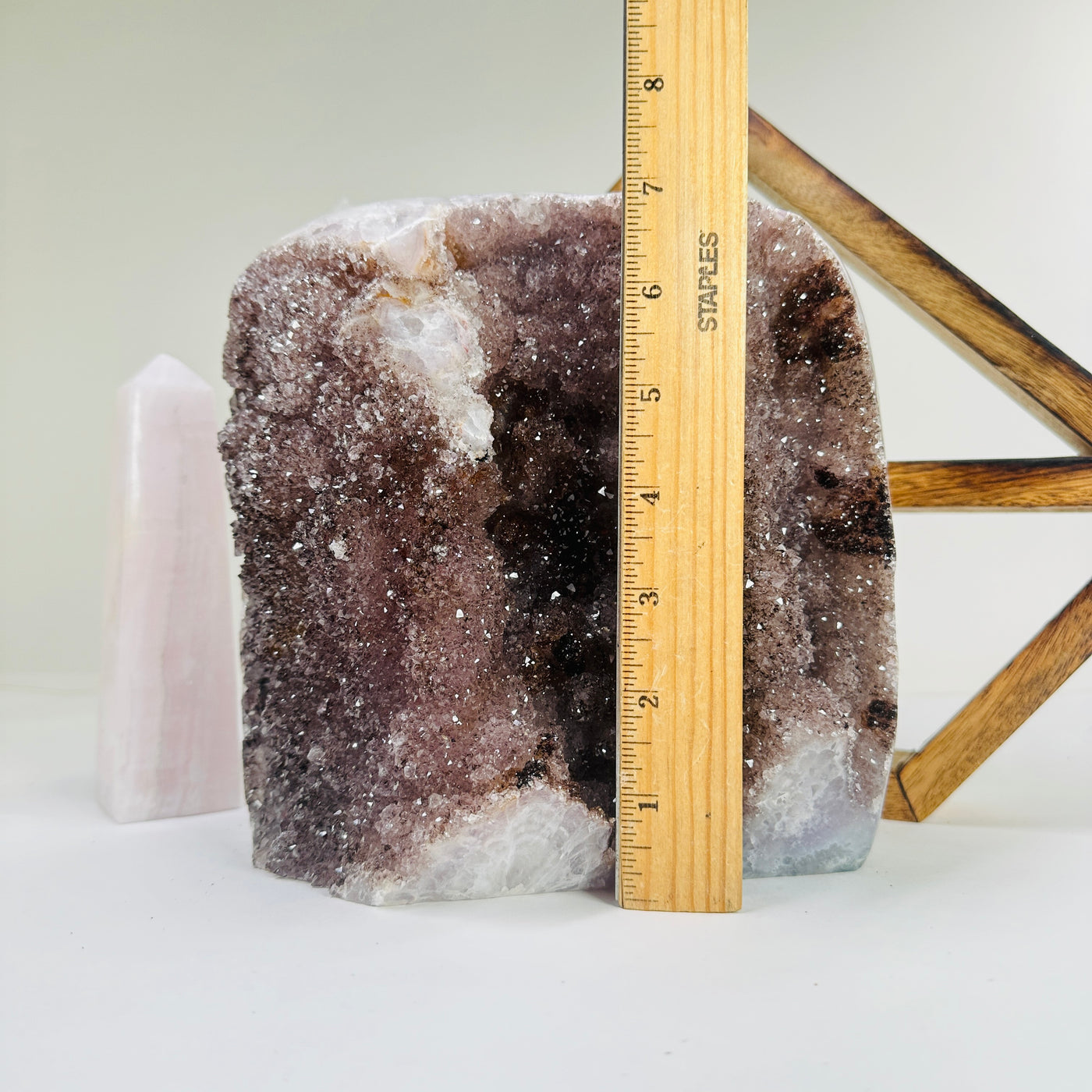 amethyst cut base next to a ruler for size reference