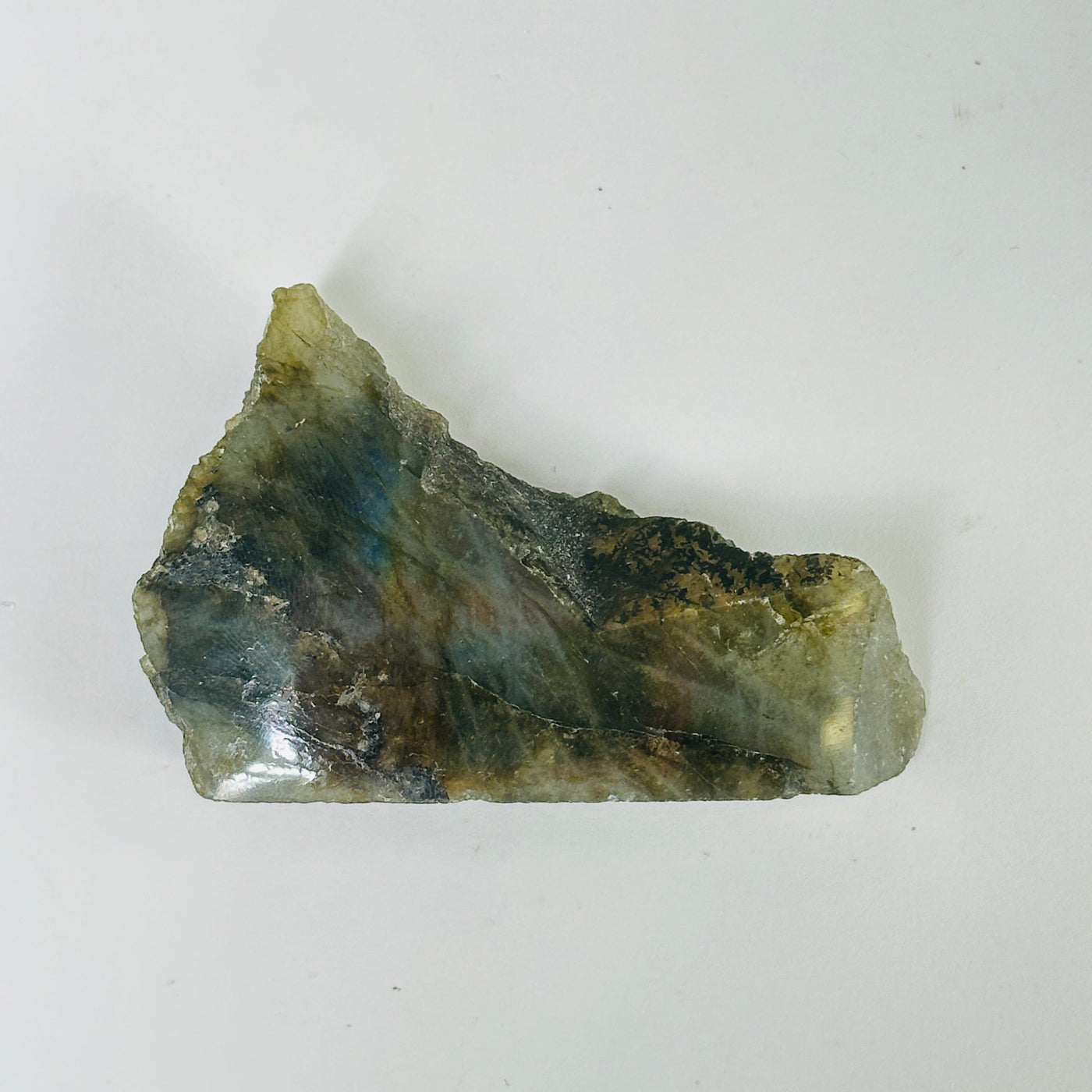 labradorite with decorations in the background