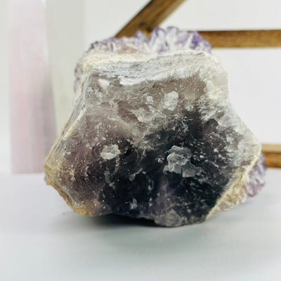 elestial amethyst with decorations in the background