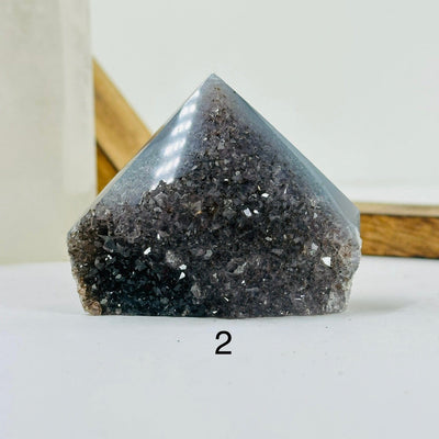 amethyst points with decorations in the background