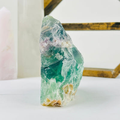 fluorite with decorations in the background