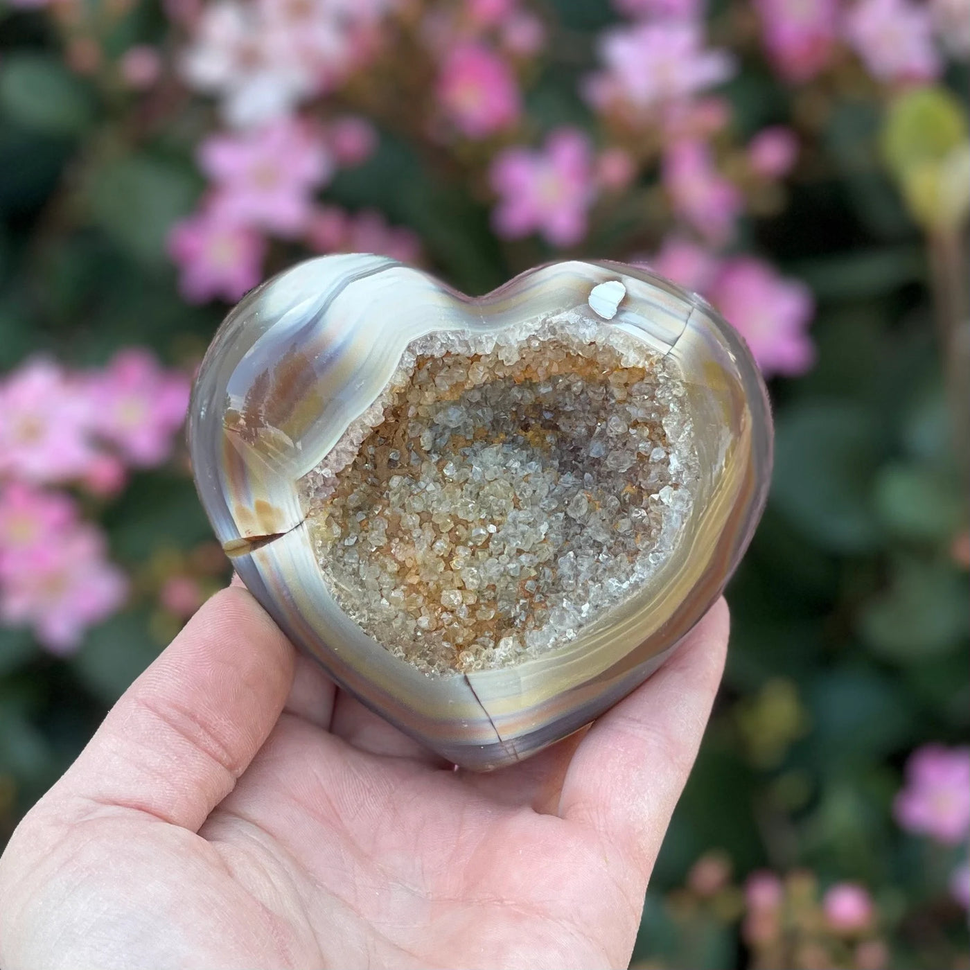 agate heart with decorations in the background