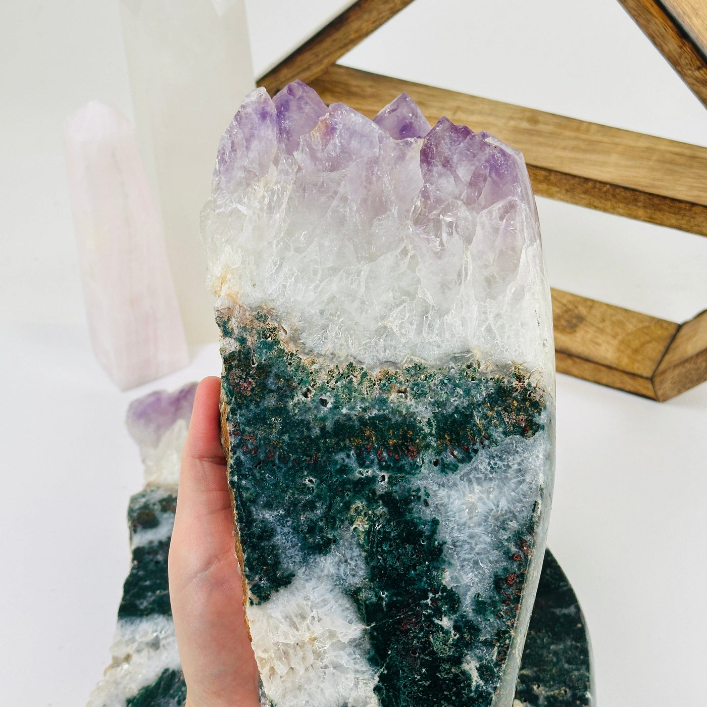 amethyst slab with decorations in the background
