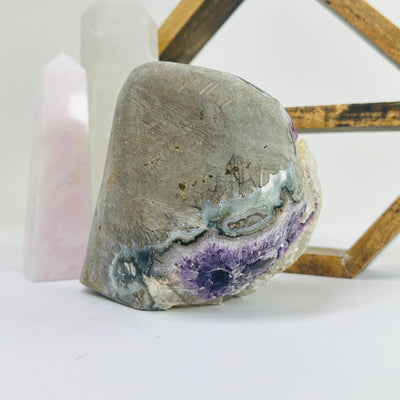 amethyst with decorations in the background