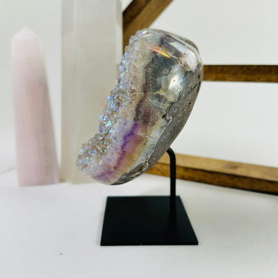 angel aura amethyst heart with decorations in the background