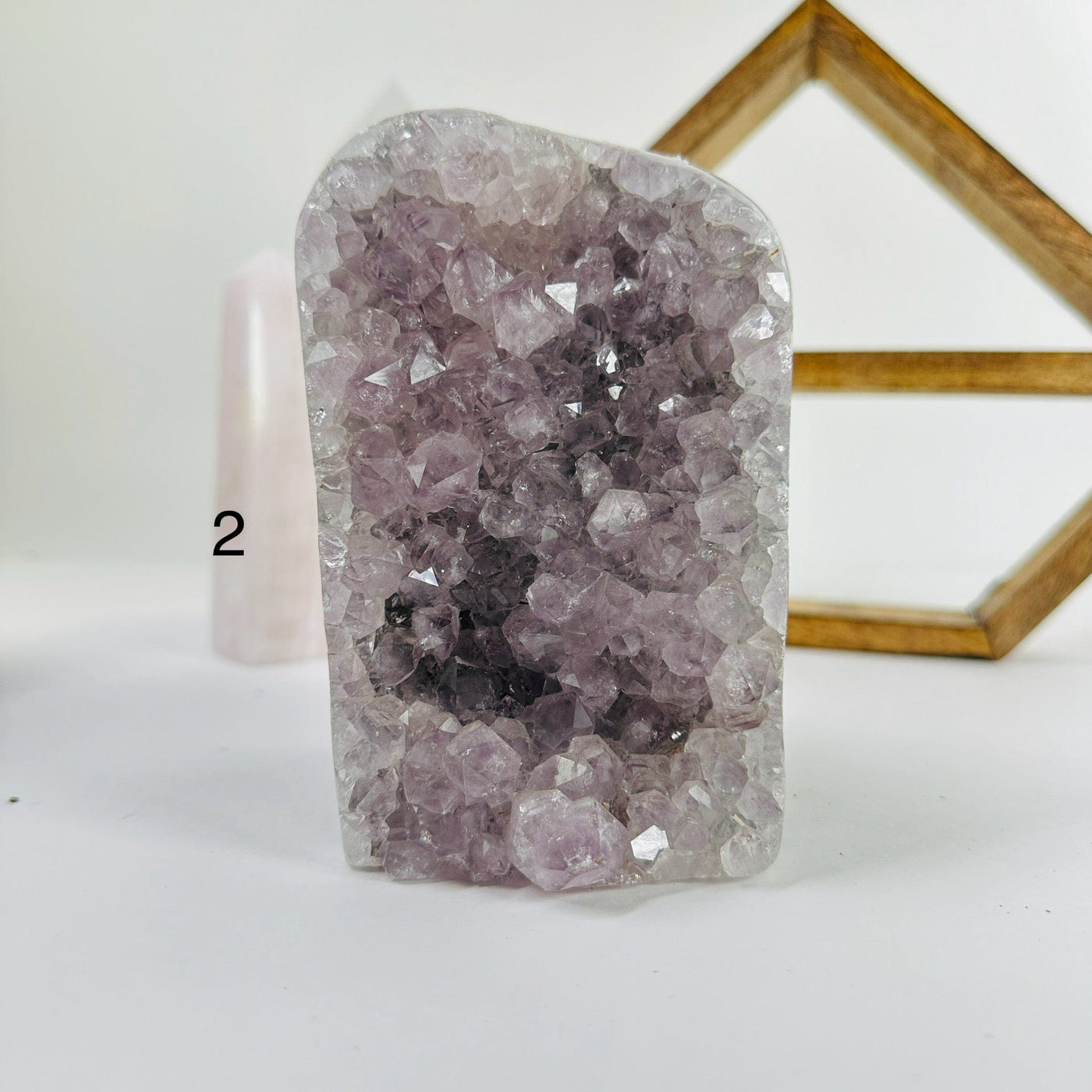 amethyst candle holder with decorations in the background