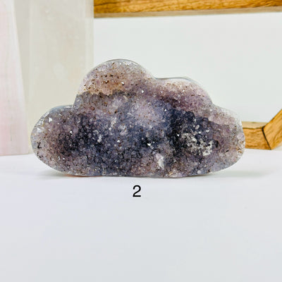 amethyst cloud with decorations in the background