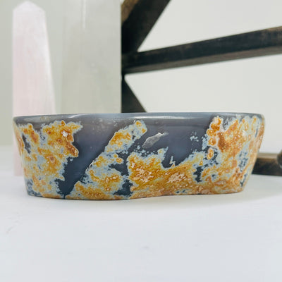 agate bowl with decorations in the background