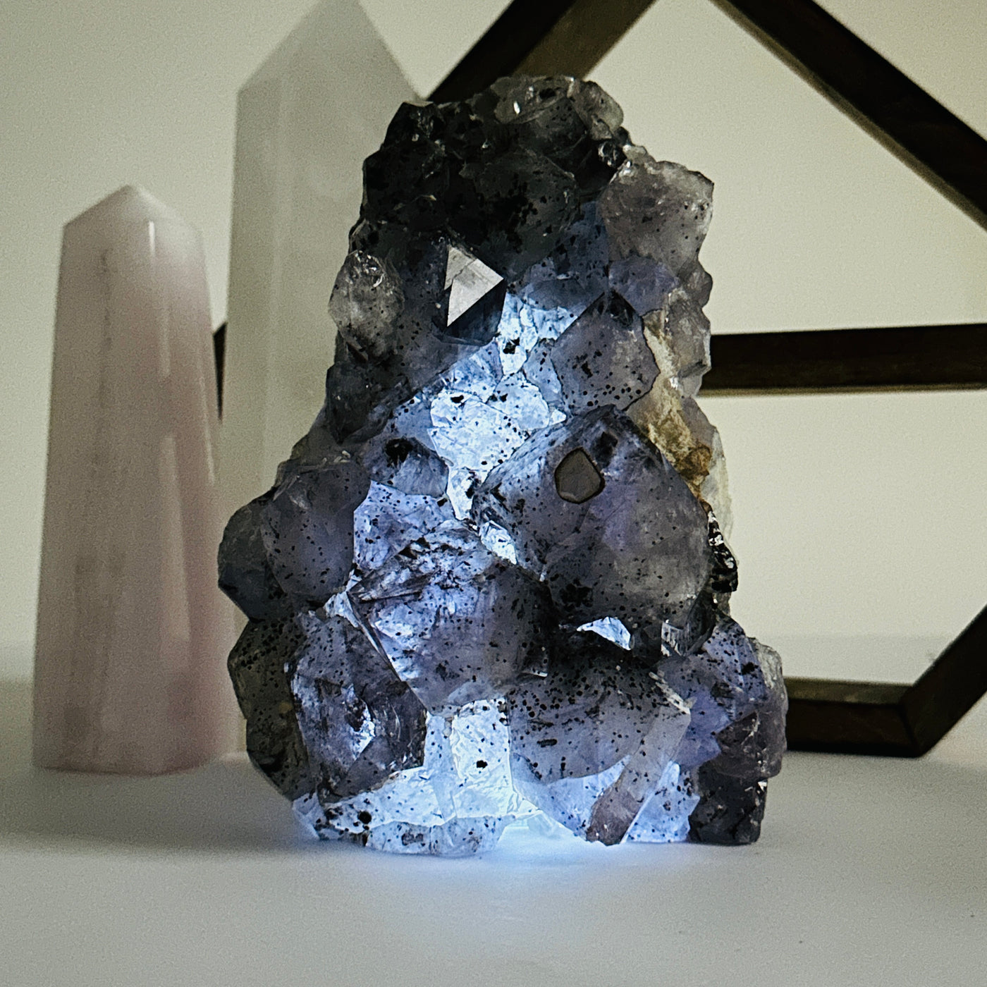 amethyst lamp with decorations in  the background