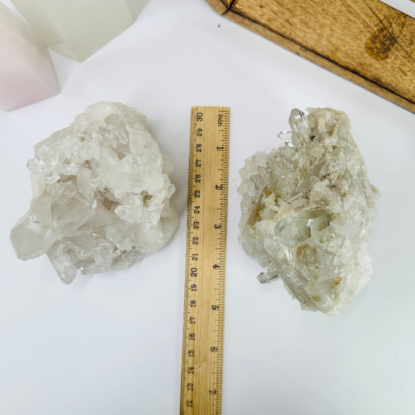 crystal quartz cluster next to a ruler for size reference