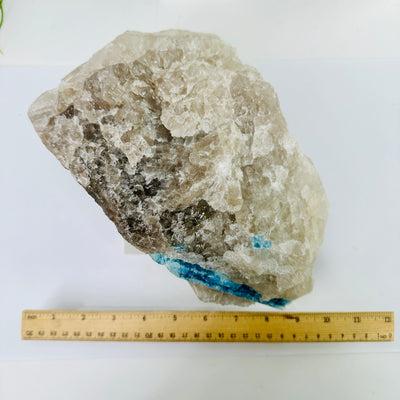  Aquamarine in matrix - aquamarine crystal diagonally embedded in natural rough stone top view with ruler for size reference