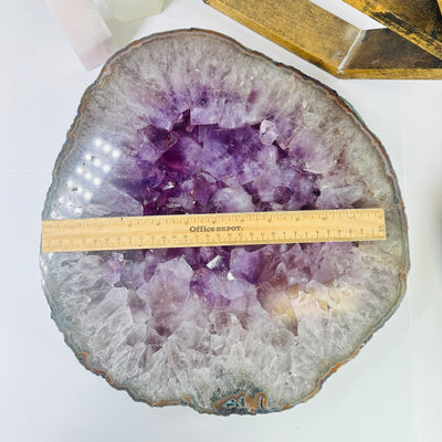 amethyst portal next to a ruler for size reference