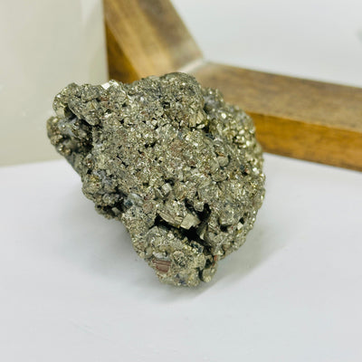 pyrite with decorations in the background