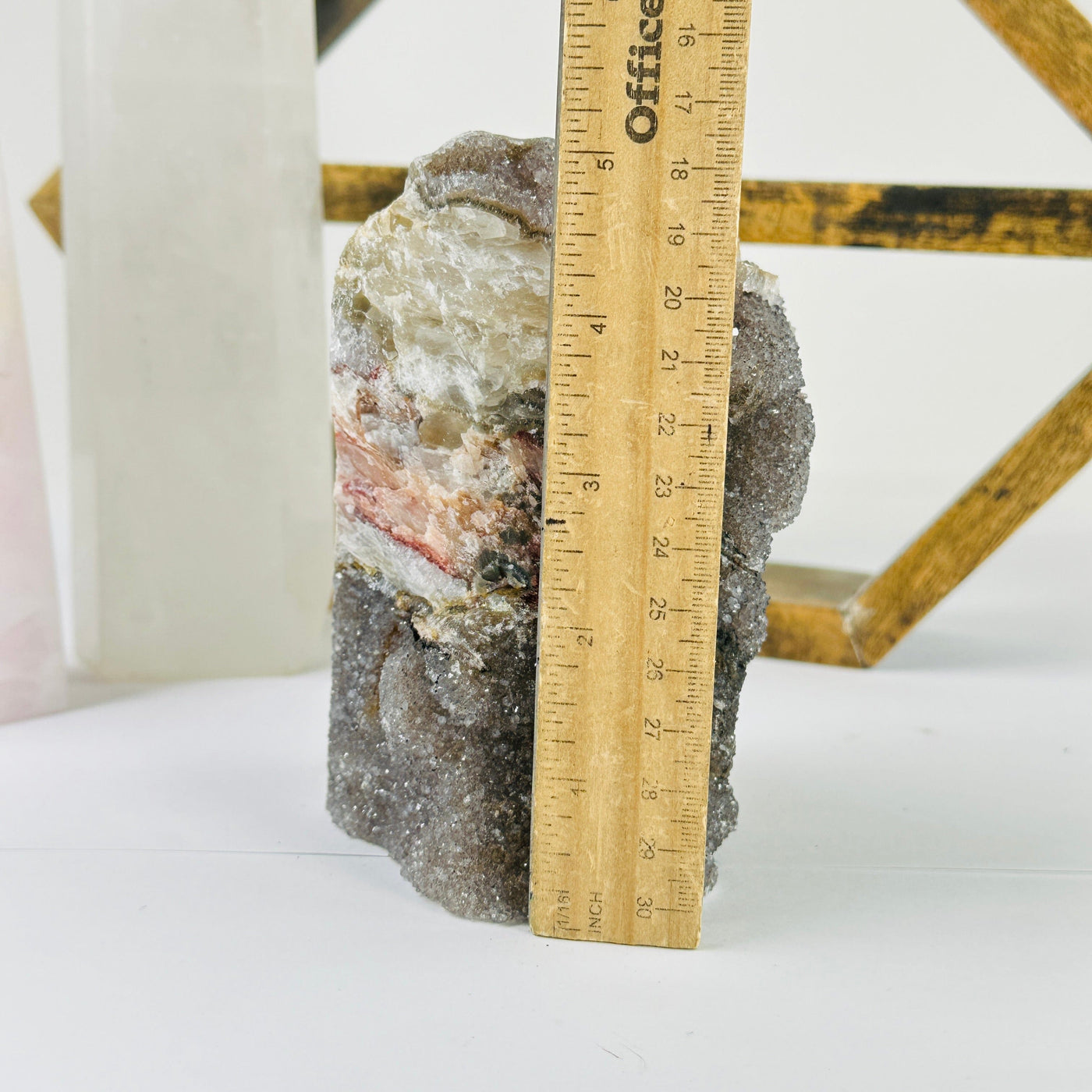 amethyst cut base next to a ruler for size reference