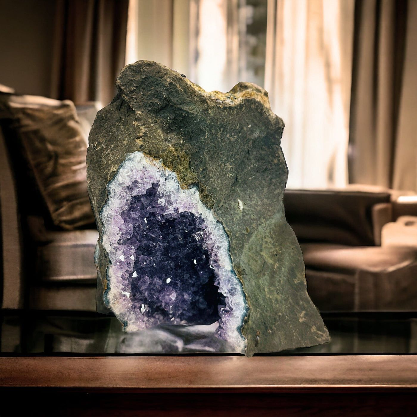  Amethyst Crystal on Matrix - You Choose - Variant E pictured on wooden table with leather sofas in background