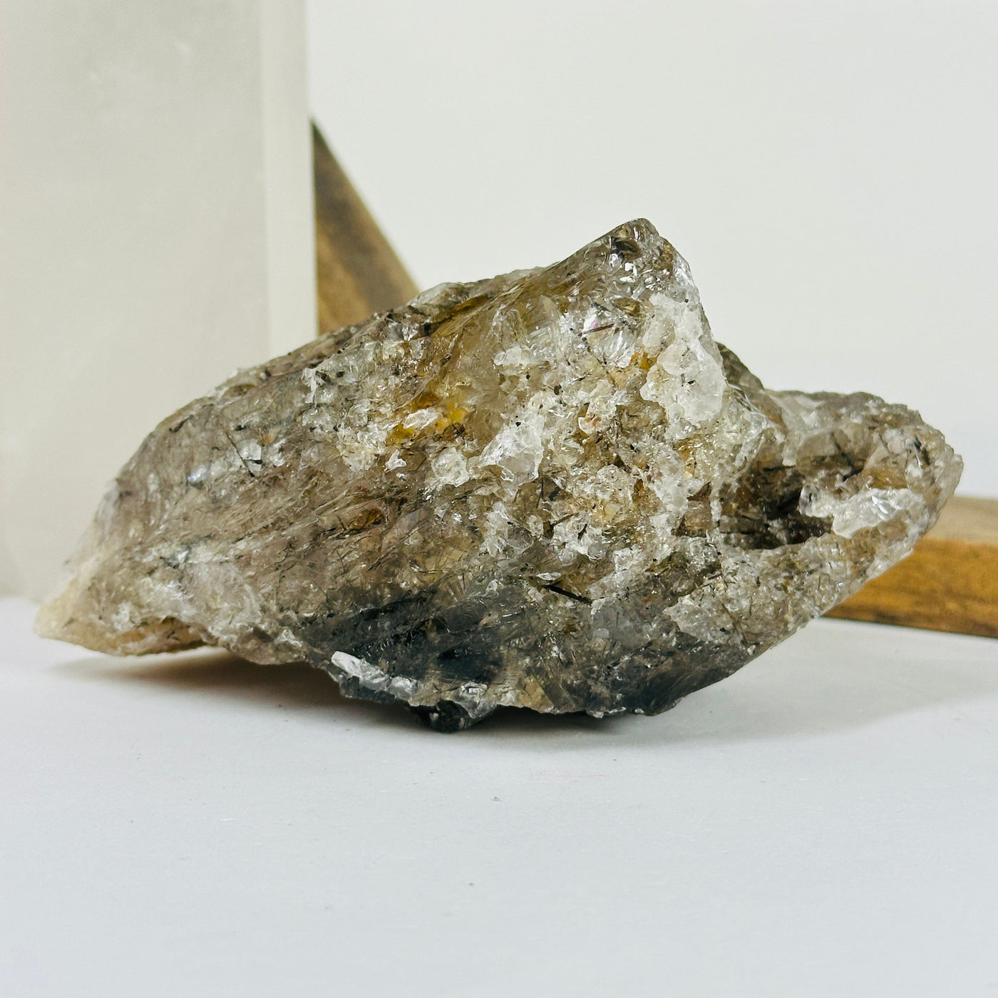 rutile quartz with decorations in the background