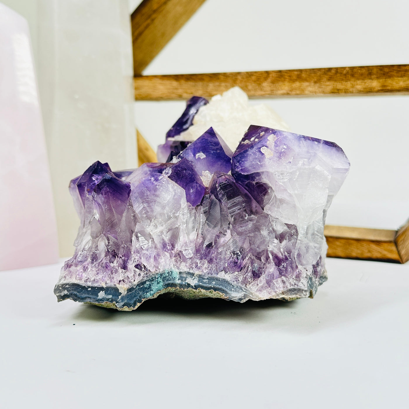 amethyst cut base with decorations in the background