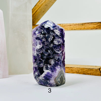 amethyst with decorations in the background