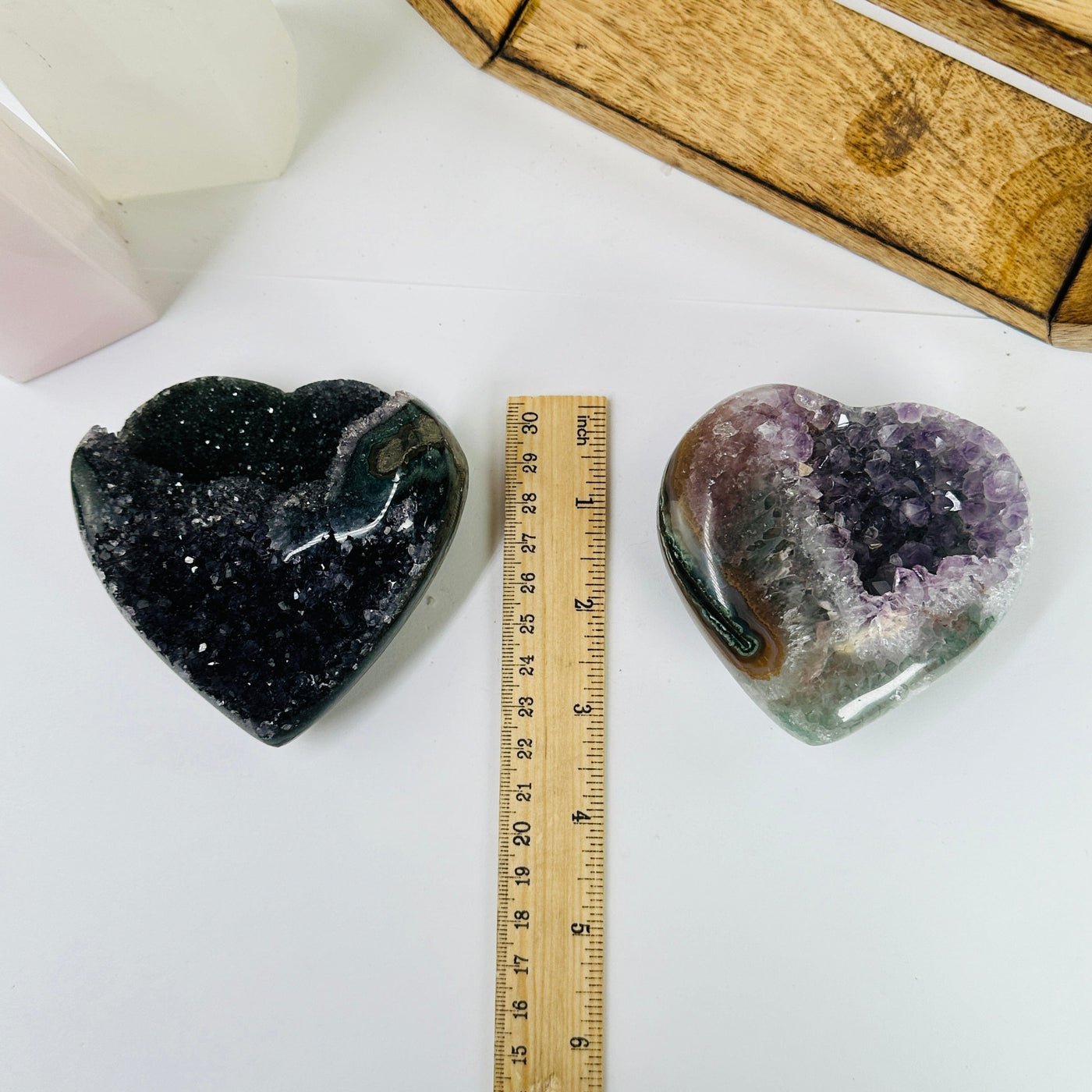 amethyst heart next to a ruler for size reference