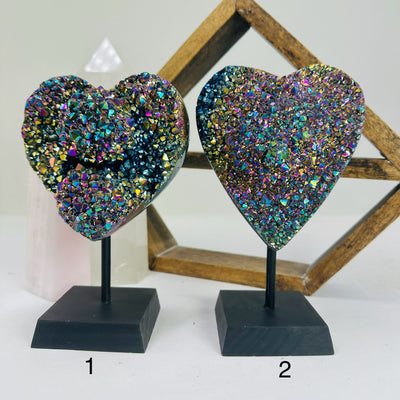 titanium coated heart on stand with decorations in the background