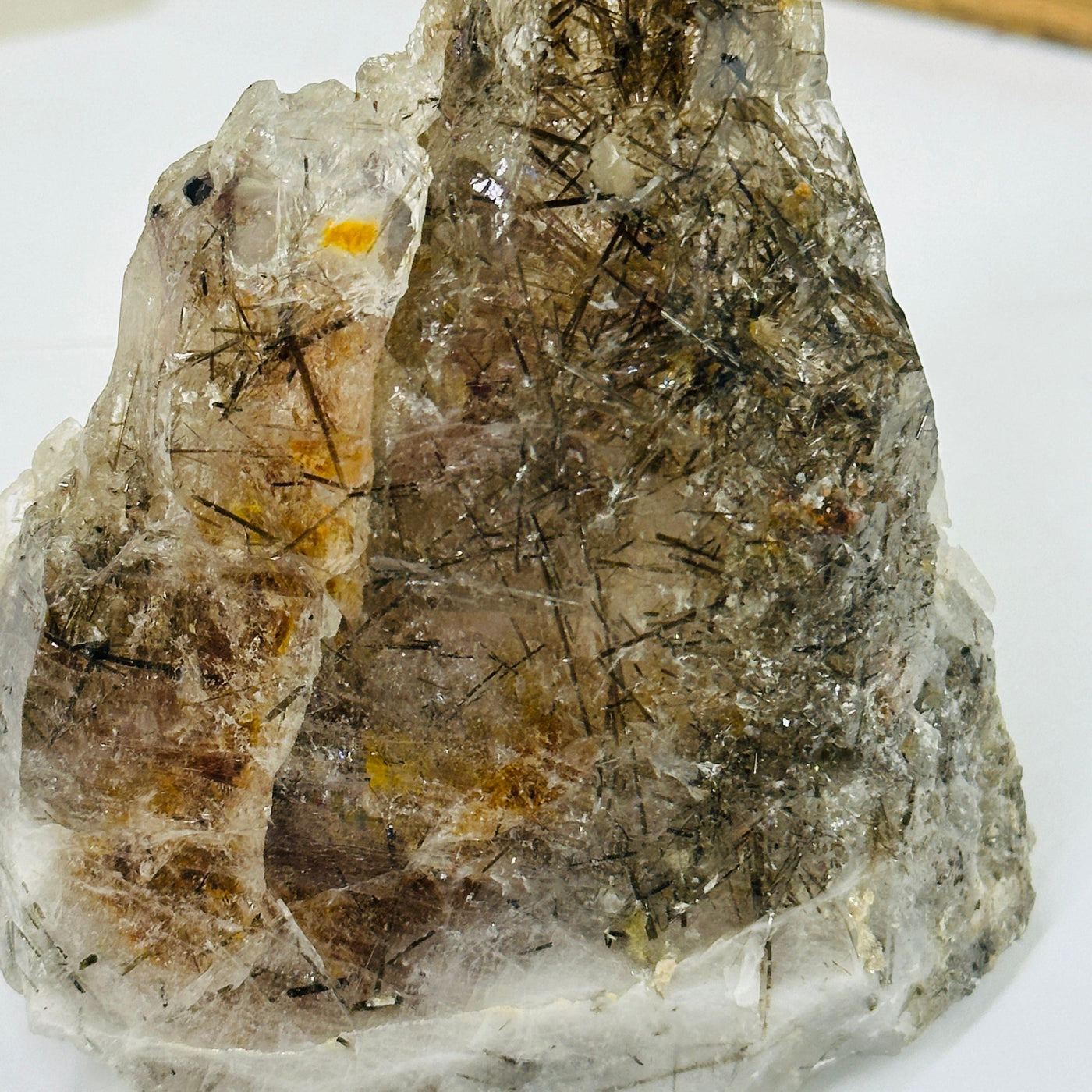 smokey quartz with decorations in the background