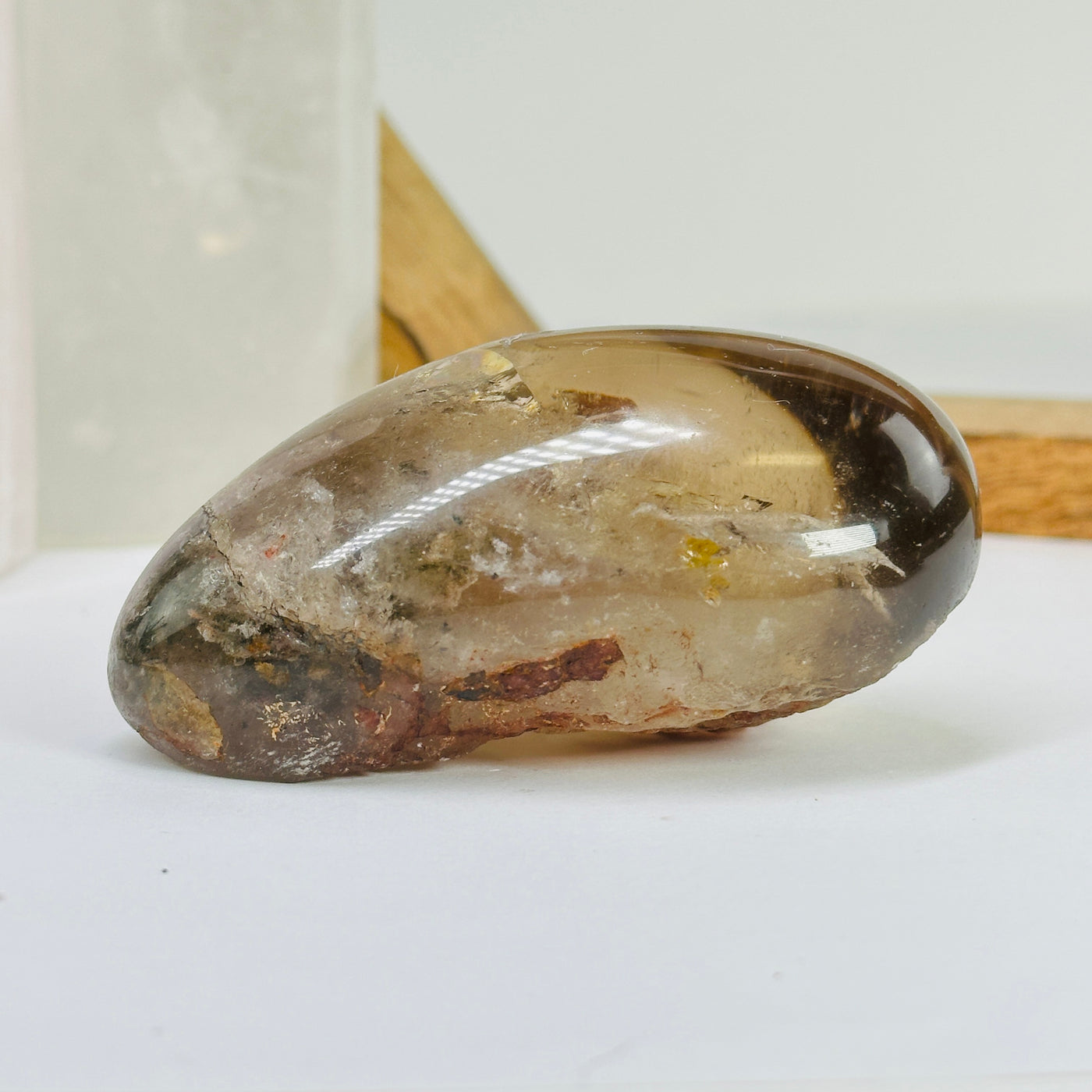 smokey quartz with decorations in the background