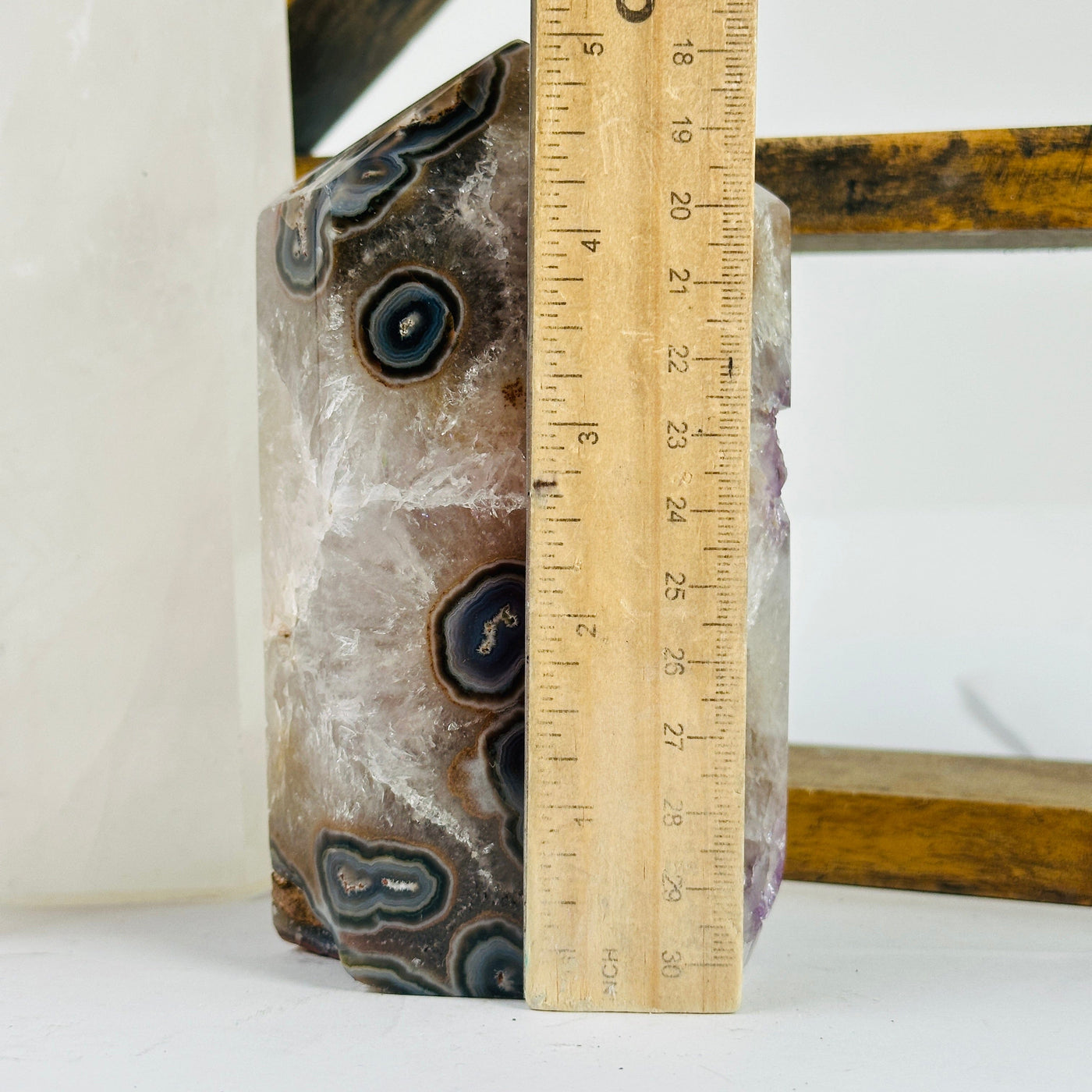 agate point next to a ruler for size reference