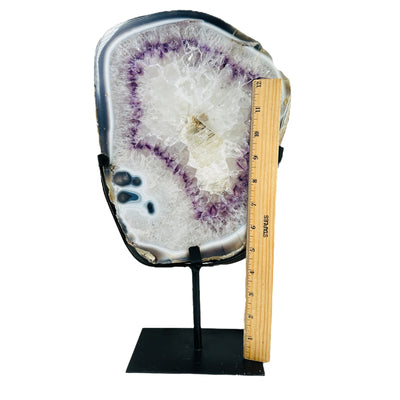 amethyst on stand on white background