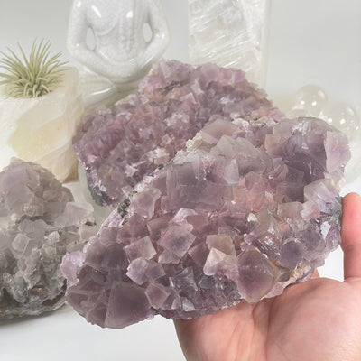 Purple Cubic Fluorite Crystal Cluster on Matrix - You Choose one in hand for size reference with other variants in the background