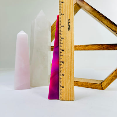 agate point next to a ruler for size reference