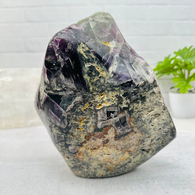back side of the fluorite tumbled stone 