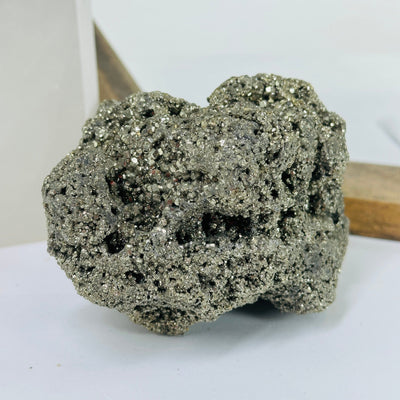 pyrite with decorations in the background