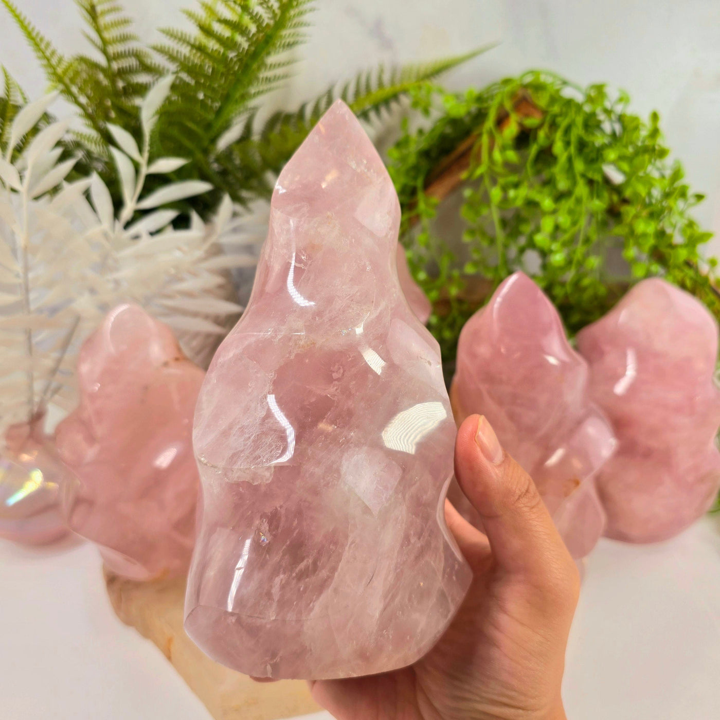 Rose Quartz Flame Tower - Carved Crystal Flame - You Choose variant C in hand for size reference