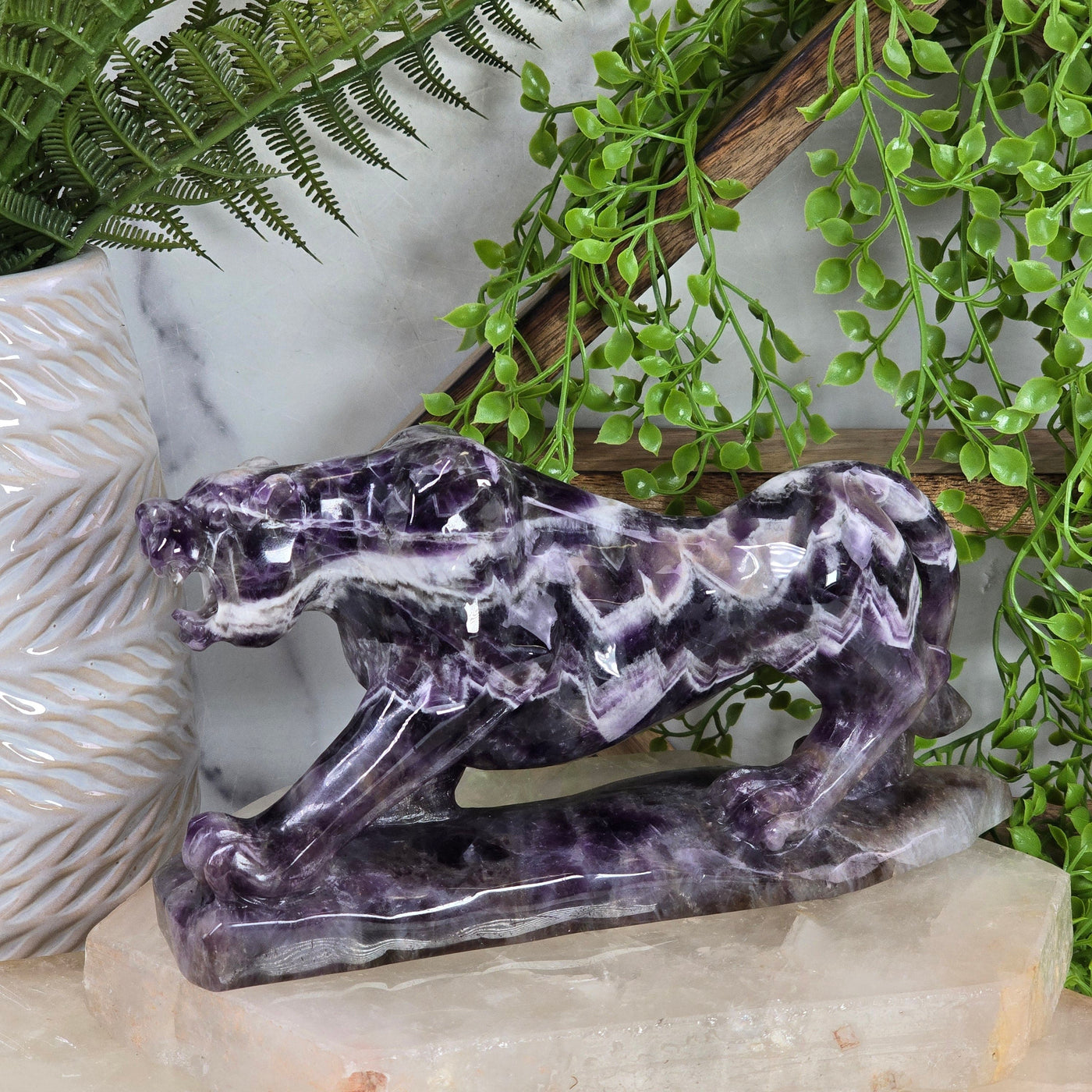 Chevron Amethyst Jaguar Statue - Carved Crystal Wildcat - OOAK side view with props in the background