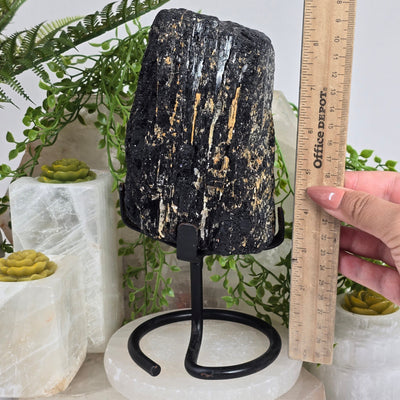 Black Tourmaline on Metal Stand - As Is with hand and ruler for size reference