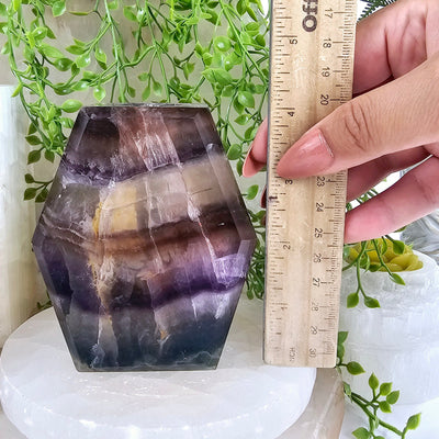 Fluorite Candle Holder with hand and ruler for size reference