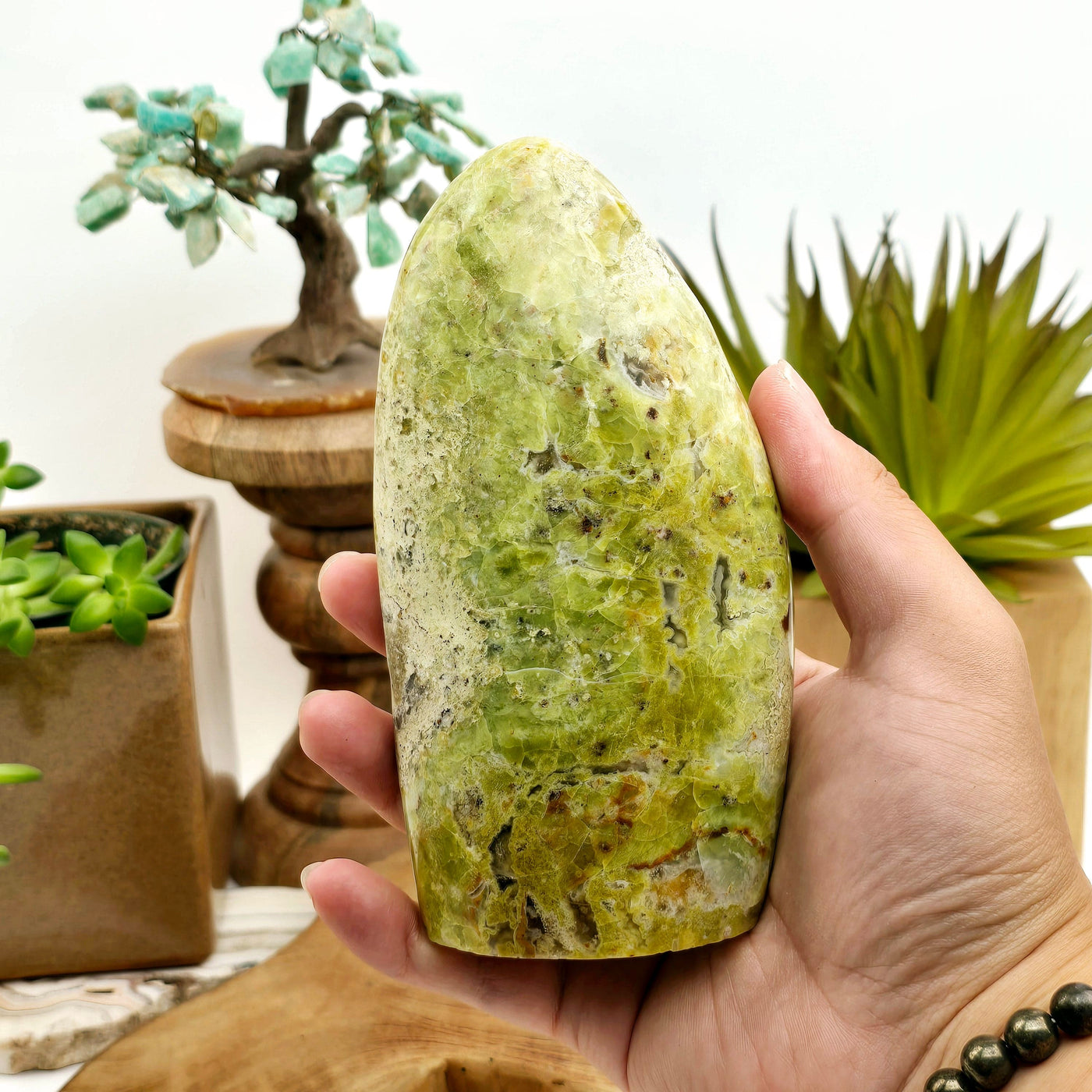 Green Opal Cut Base - One-of-a-Kind #2 in hand for size reference with props in the background