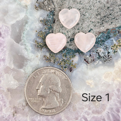 Rose Quartz Crystal Hearts - By Size - size 1 labeled next to quarter for size reference